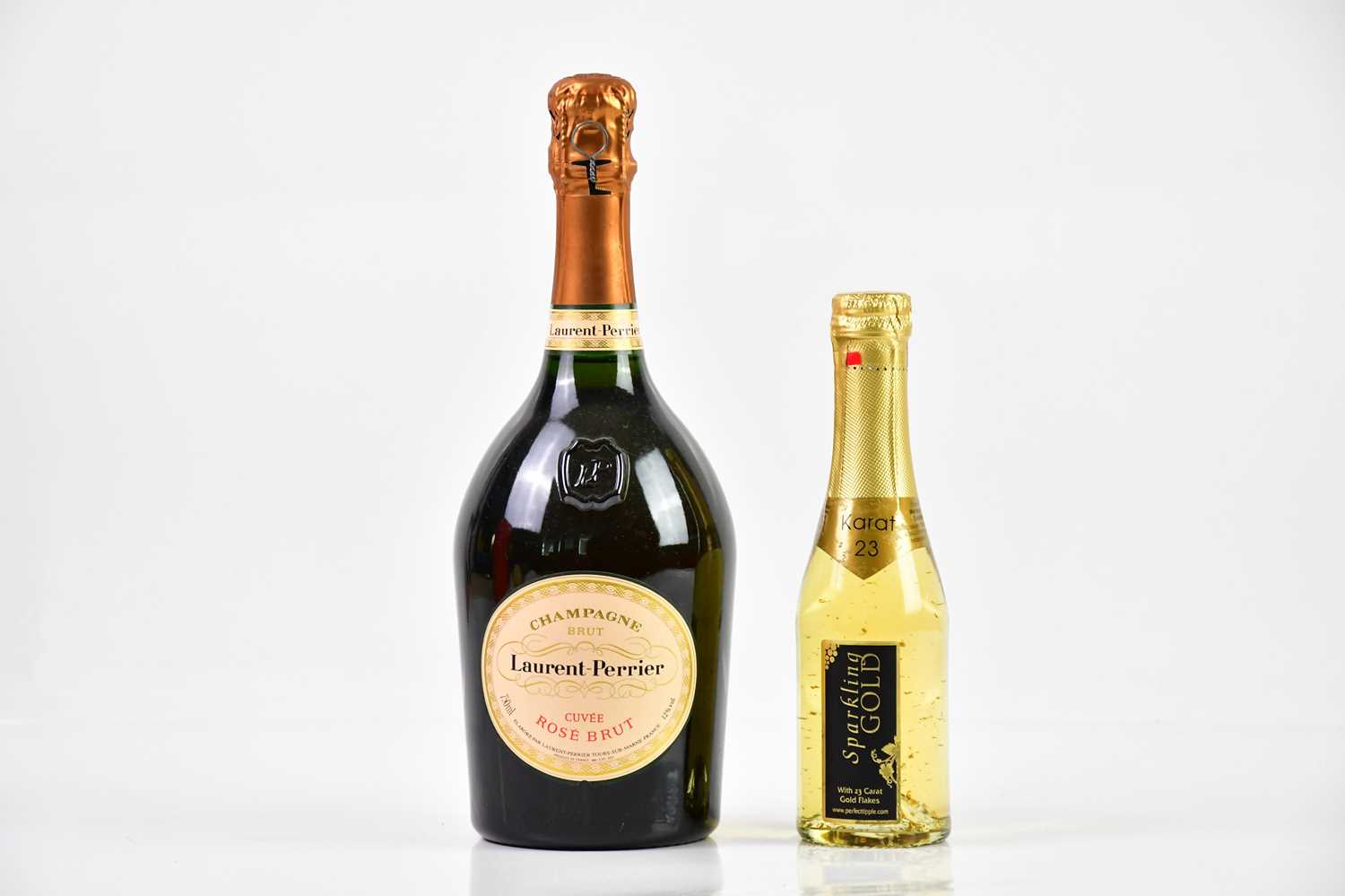 CHAMPAGNE; a bottle of Laurent-Perrier Cuvée Rosé Brut, boxed, with a half bottle of Austria