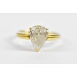 An 18ct yellow gold diamond solitaire ring, the pear shaped stone weighing approx. 2cts, with