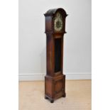 An early 20th century oak longcase clock, with St Michael Westminster and Withington chimes, on