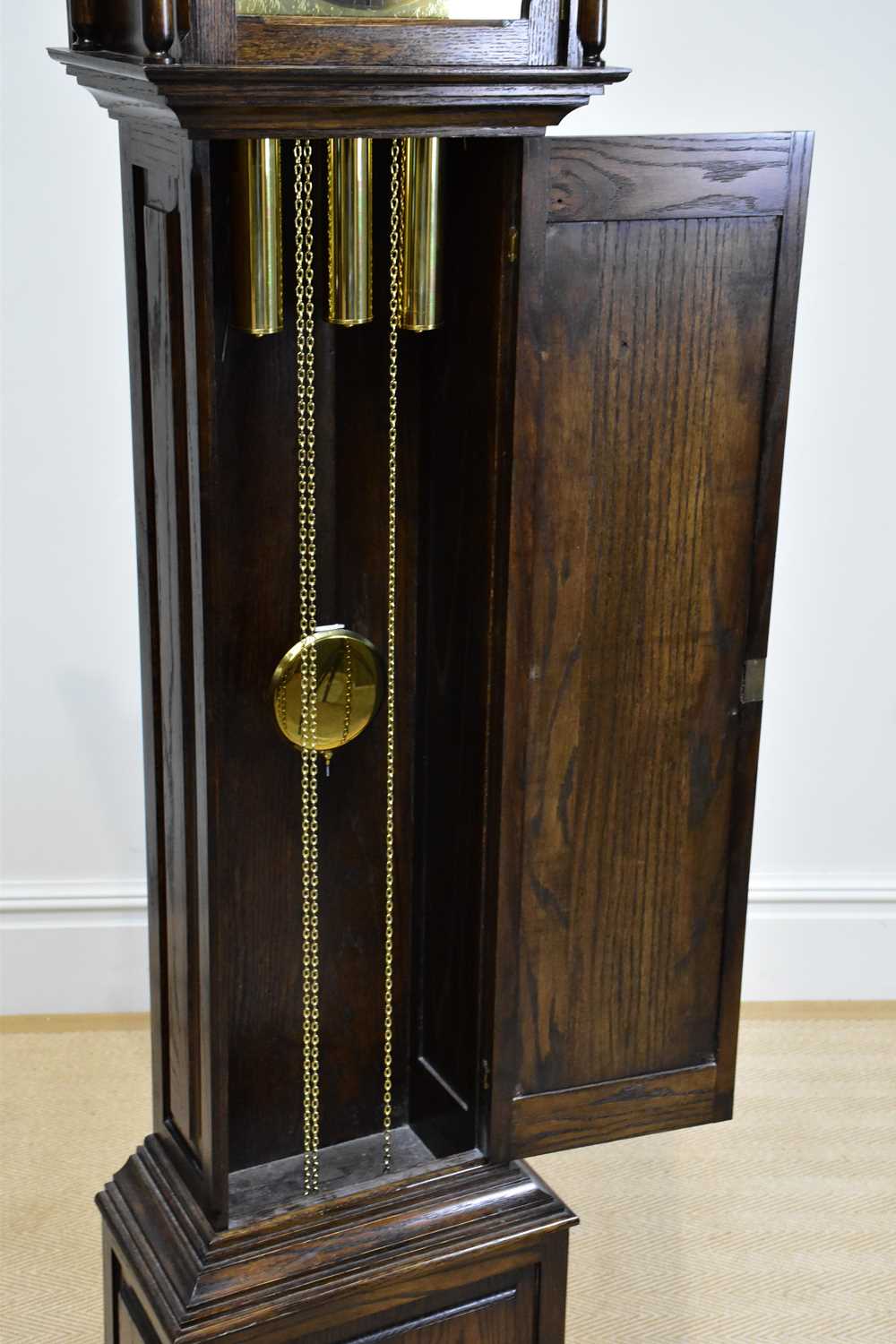 PAUL EDEN, LONGNOR; a reproduction oak longcase clock of small proportions, height 188cm. - Image 3 of 4