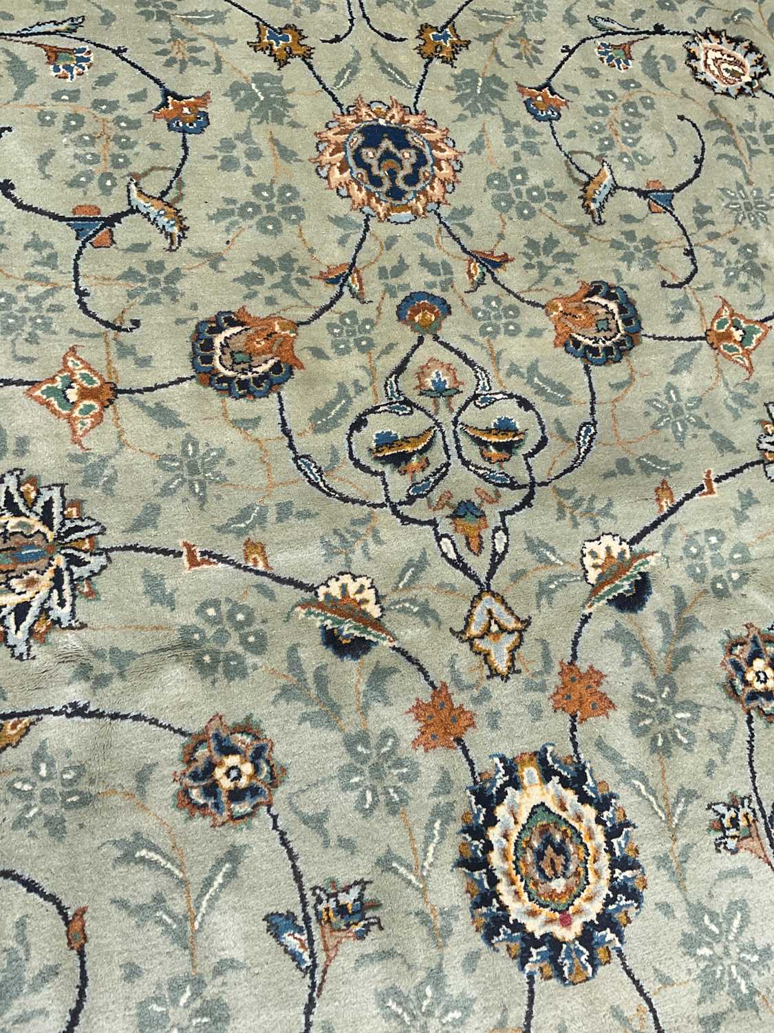 A pale blue wool carpet with floral pattern, 400 x 300cm. Condition Report: Worn corner and small - Image 7 of 8