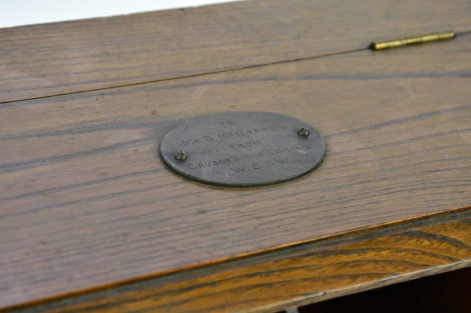 A 1920s oak smoker's cabinet with two glazed doors and a presentation plaque, five cigarette - Image 4 of 4