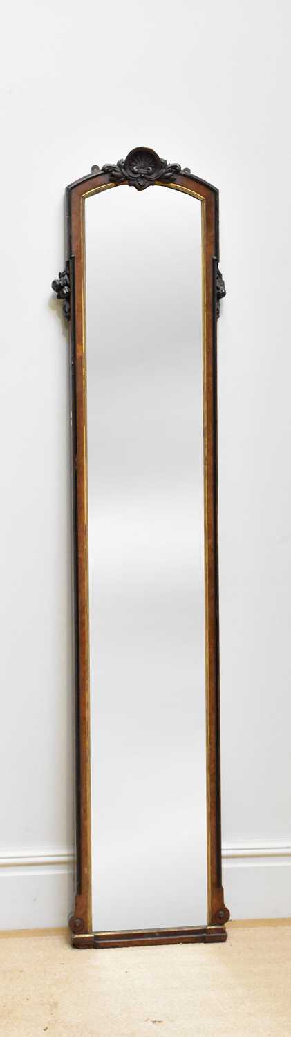 A Victorian carved walnut freestanding mirror, height 204cm.