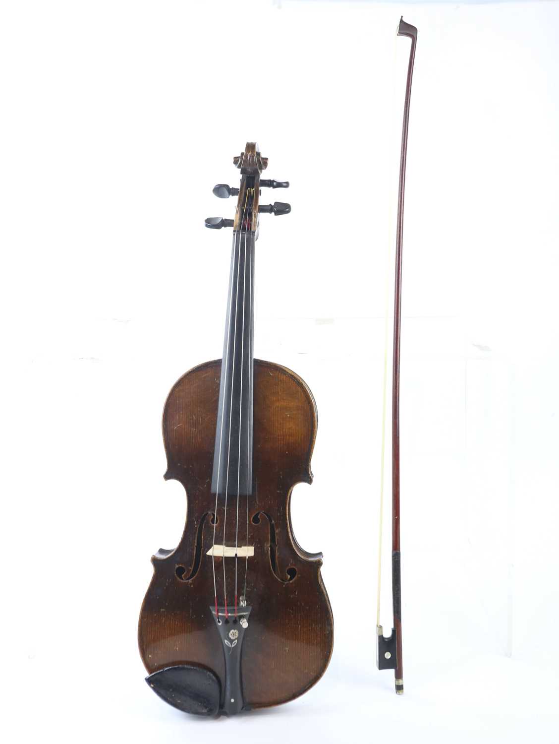 A German violin with a 36cm two piece back and bow.