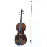 A German violin with a 36cm two piece back and bow.