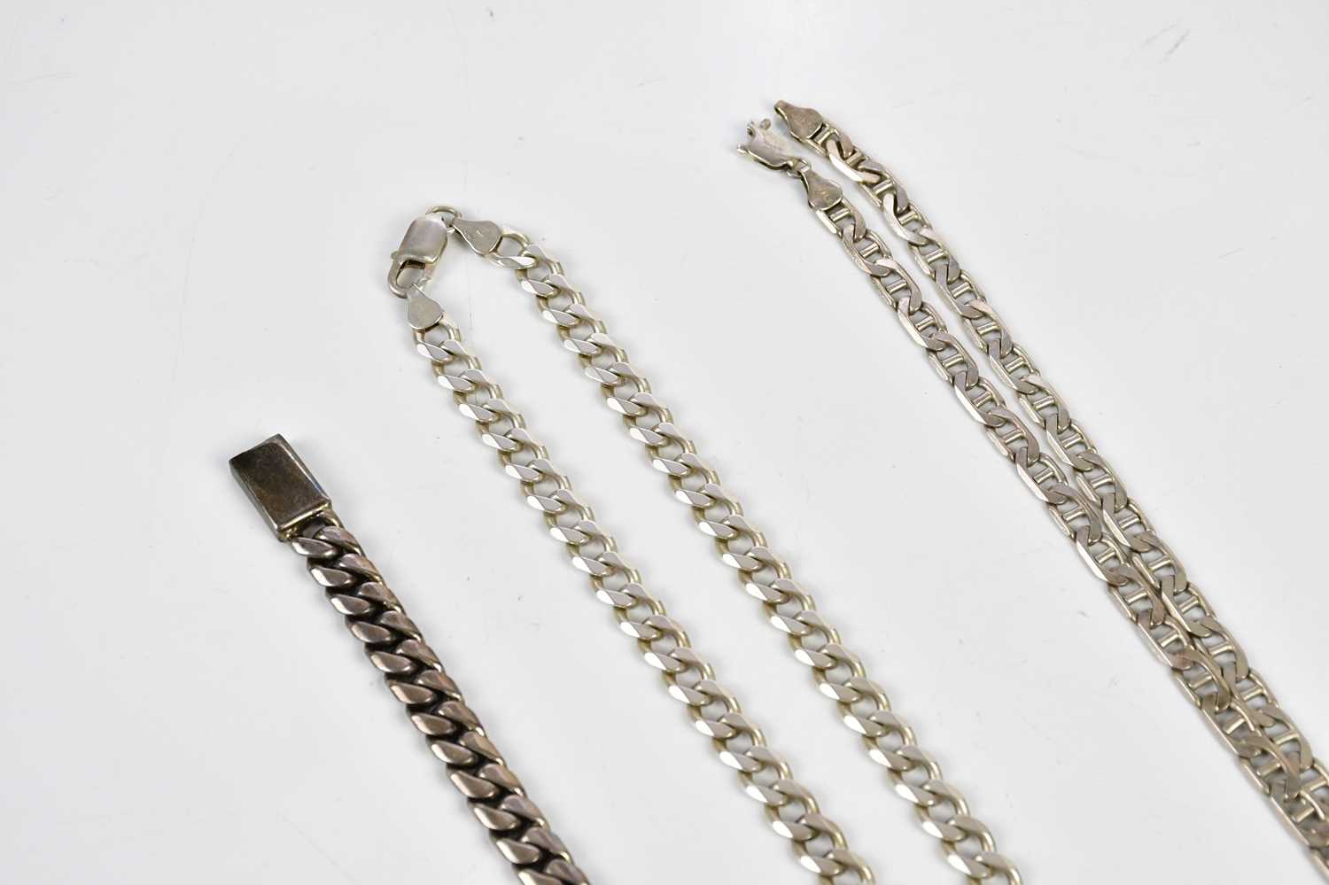 A sterling silver curb link necklace, a similar example (clasp af), and a sterling silver curb - Image 2 of 3
