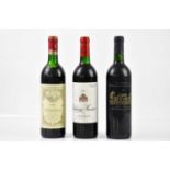 RED WINE; three bottles of mixed red wine including a bottle of Saint Émilion Grand Cru 1989, a