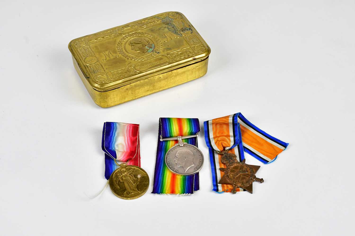 A WWI medal trio, a 1914-15 Star, a British War Medal and a Defence Medal, awarded to 14398