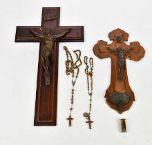 A gilt metal bronzed model of Christ on the crucifix, height 50cm, a similar smaller example, two