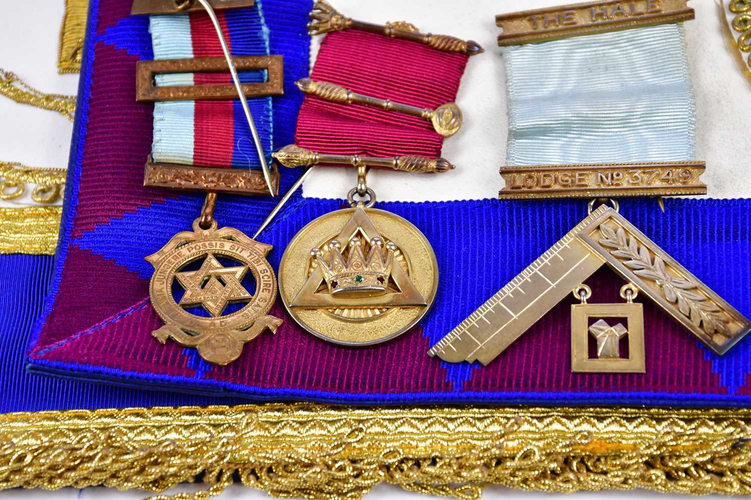 A collection of Masonic regalia including booklet, jewels including a hallmarked silver gilt example - Image 2 of 4