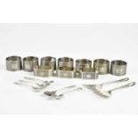 VINERS LTD; a set of six George V hallmarked silver napkin rings with engine turned decoration,