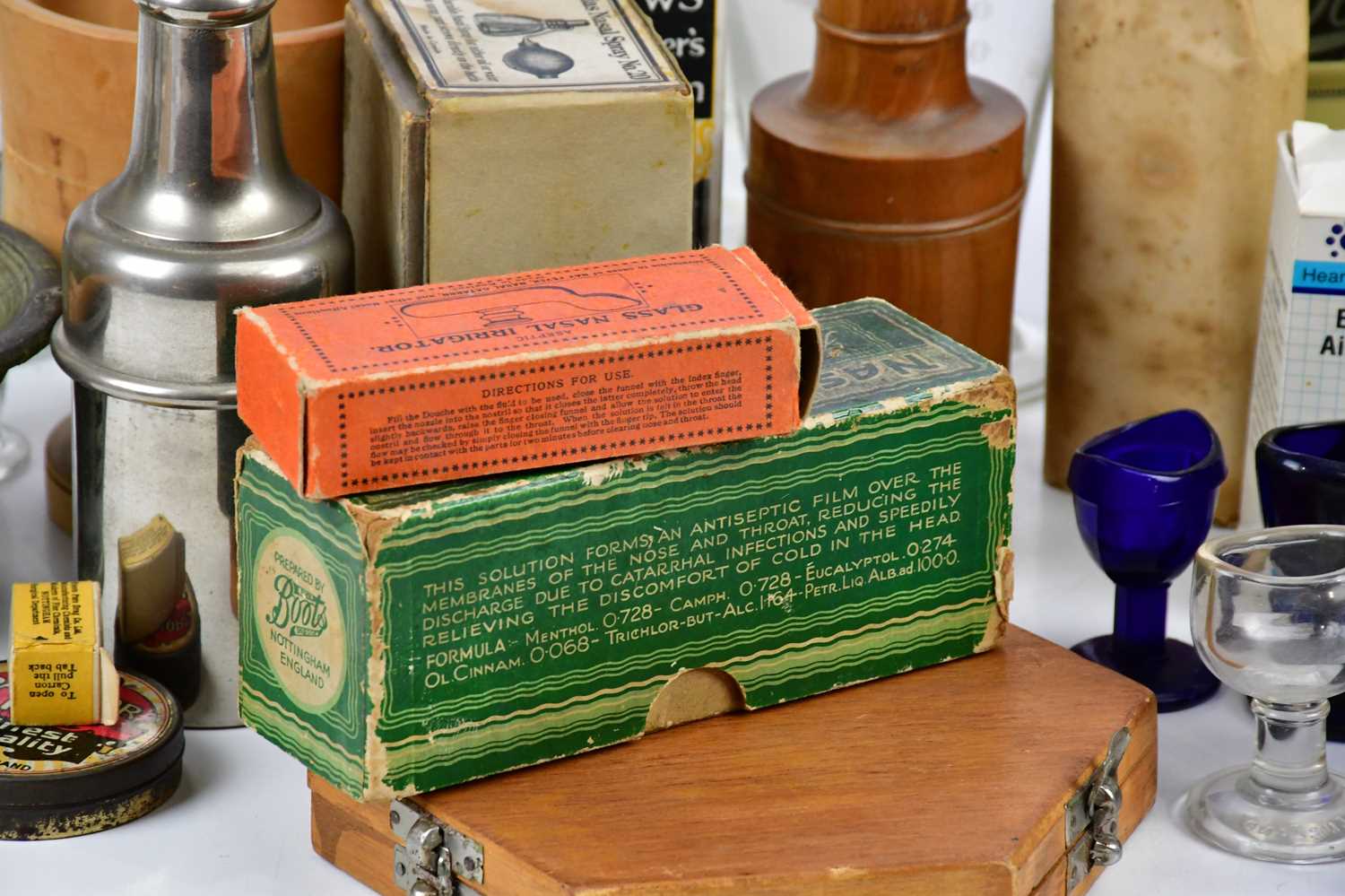 A collection of pharmaceutical items including test tubes, measuring glasses, eye baths, pestles and - Image 4 of 5