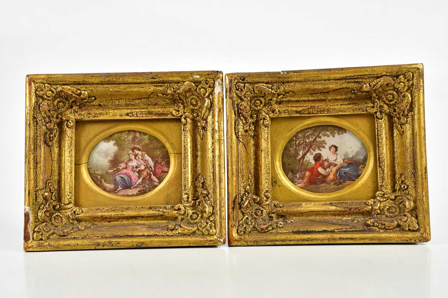 A pair of prints depicting classical figures in landscape scene in ornate gilt frames, 7 x 8cm,