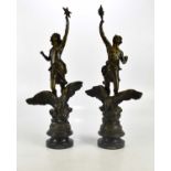 A pair of early 20th century bronzed figures, 'Le Jour' and 'La Nuit', on socle bases, height