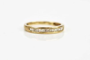 A 9ct gold and diamond set half eternity ring, size P, weight 1.8g