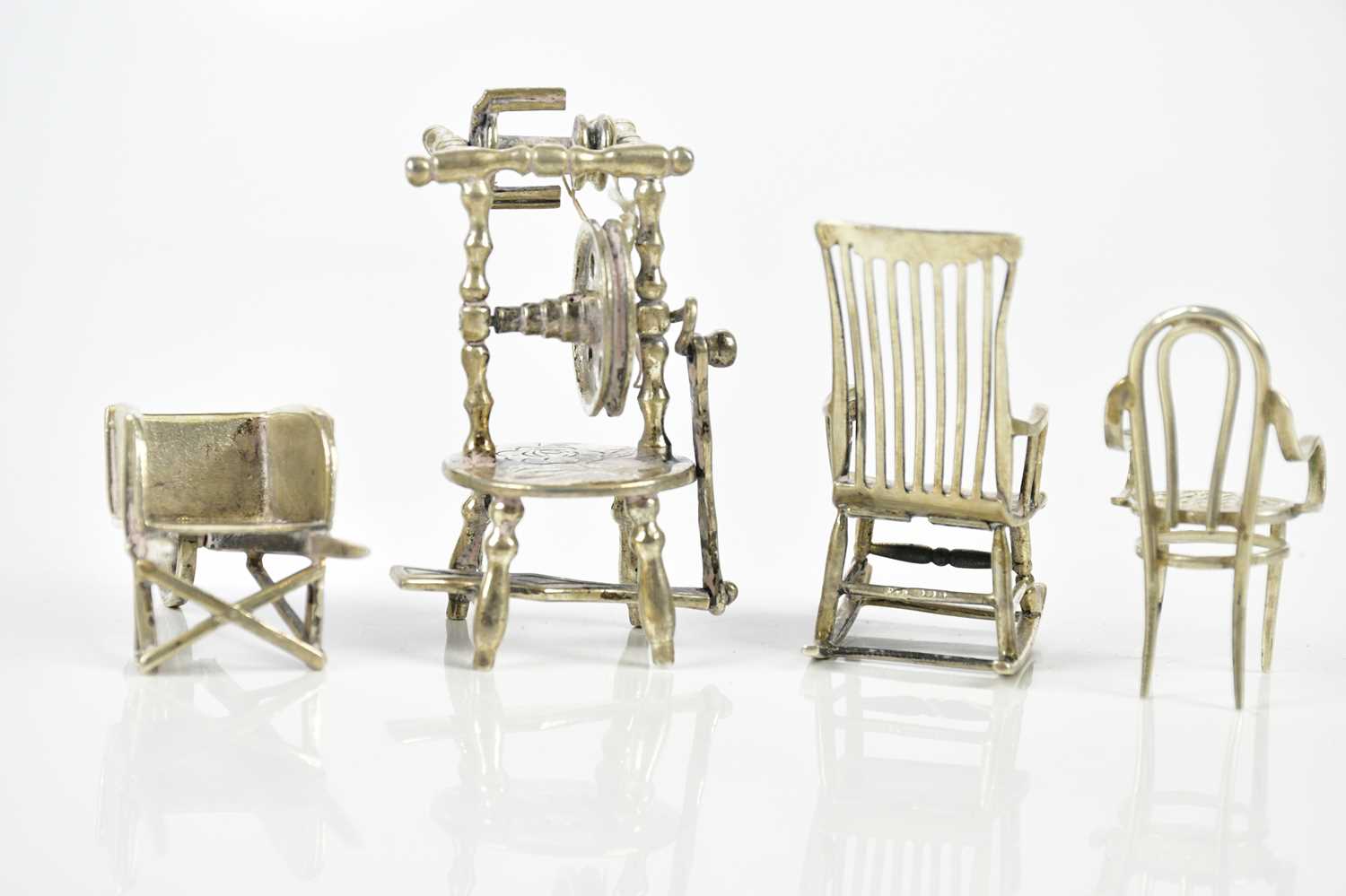 A group of miniature items including rocking chair, spinning wheel, elbow chair and a wheelbarrow, - Image 2 of 3