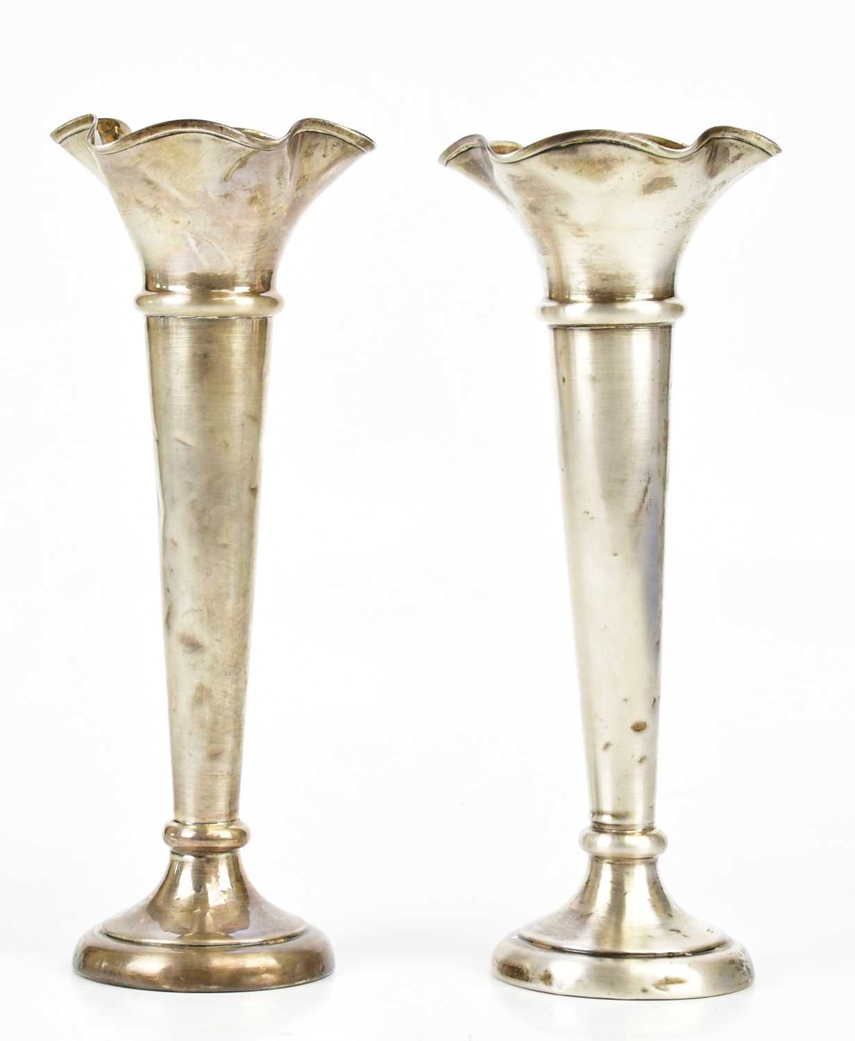 WALKER & HALL; a pair of hallmarked silver George VI weighted posy vases, Sheffield 1939, height