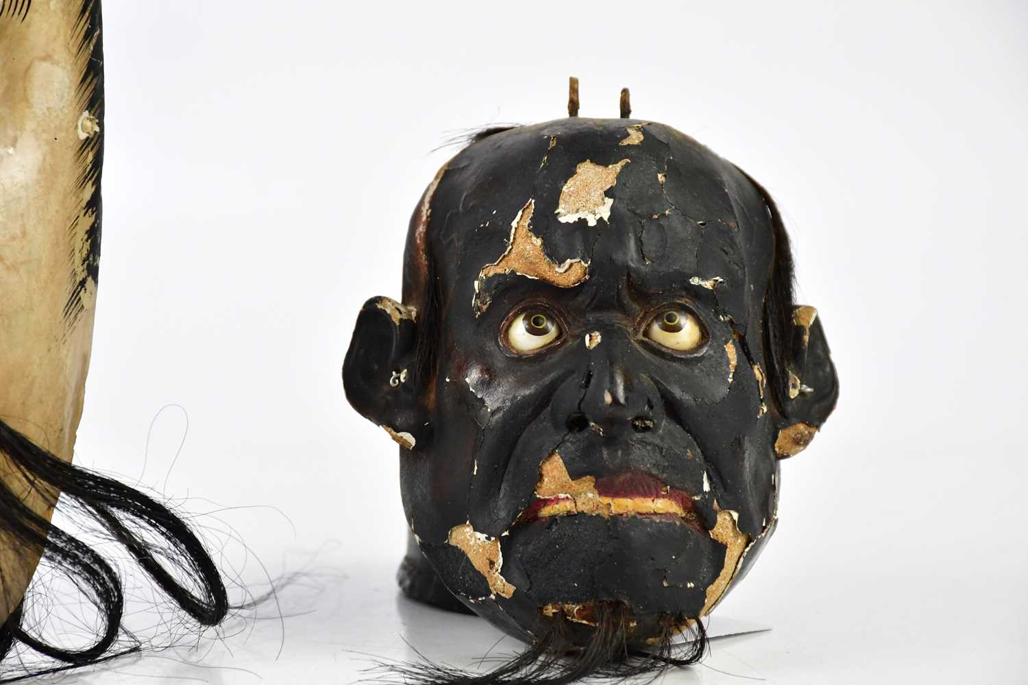Two painted wooden 1930s face masks, largest 19cm. - Image 2 of 4