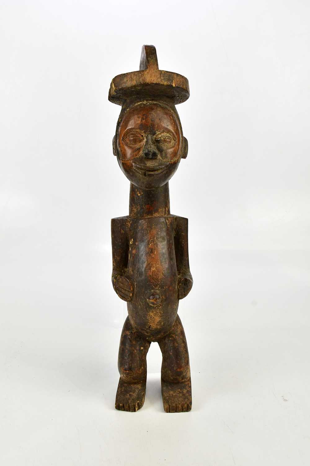 A Nkisi carved wooden Congo spirit figure, height 51cm.