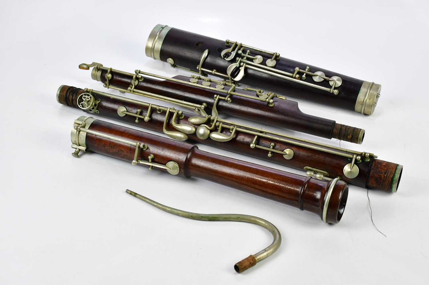 BUFFET CRAMPON, PARIS; a late 19th/early 20th century rosewood bassoon with nickel mounts, cased.