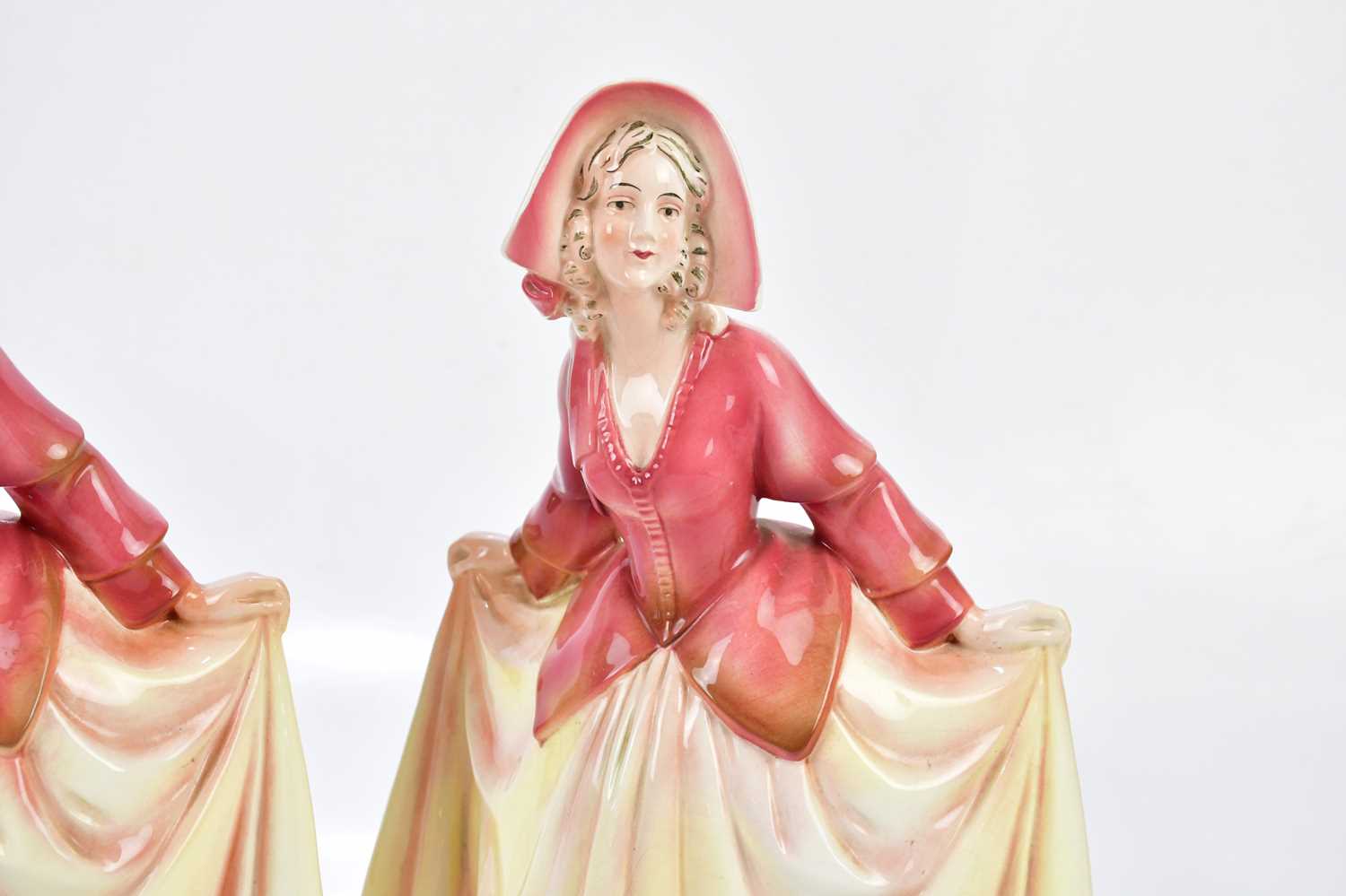 KATZHUTTE; two Art Deco ceramic figures depicting a maiden wearing a bonnet with flowing dress, - Image 4 of 7