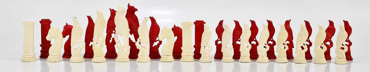 A carved fish bone chess set, height of kings 10cm.