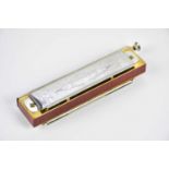 HOHNER; a Super Chromonica Chromatic harmonica, cased.