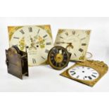 A collection of longcase clock faces, movements and parts, to include an 18th century movement,