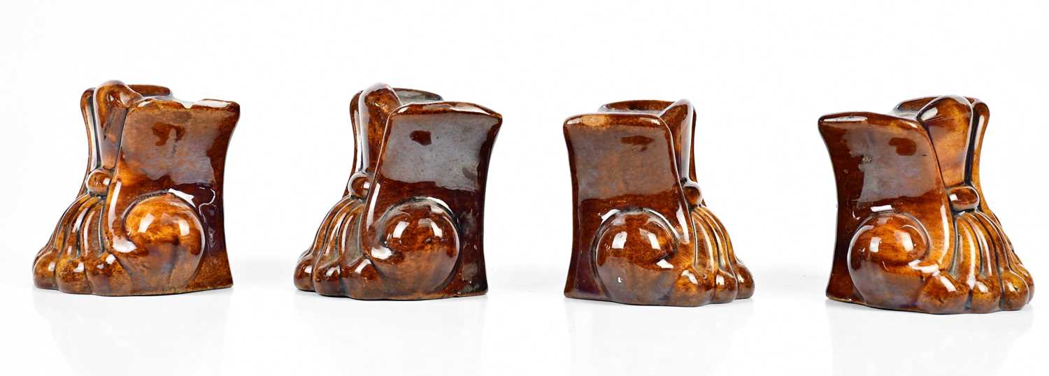 Two pairs of 19th century treacle glaze furniture rests modelled as scrolls, height 10.5cm (4). - Image 4 of 4