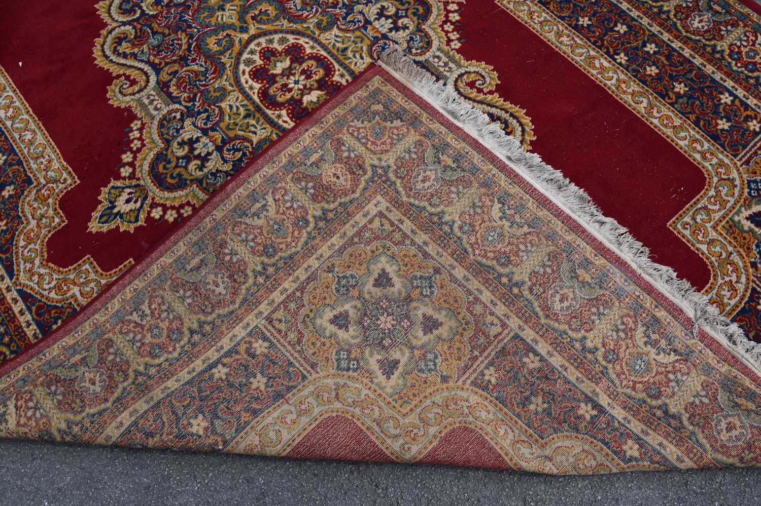 A red ground machined Tabriz style carpet, 347 x 249cm. - Image 3 of 3