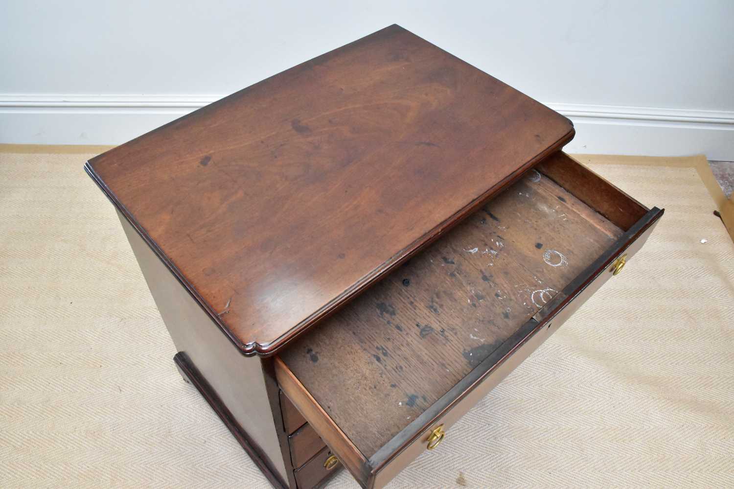 A George III mahogany kneehole desk, the seven drawers with later handles around a central - Image 2 of 4