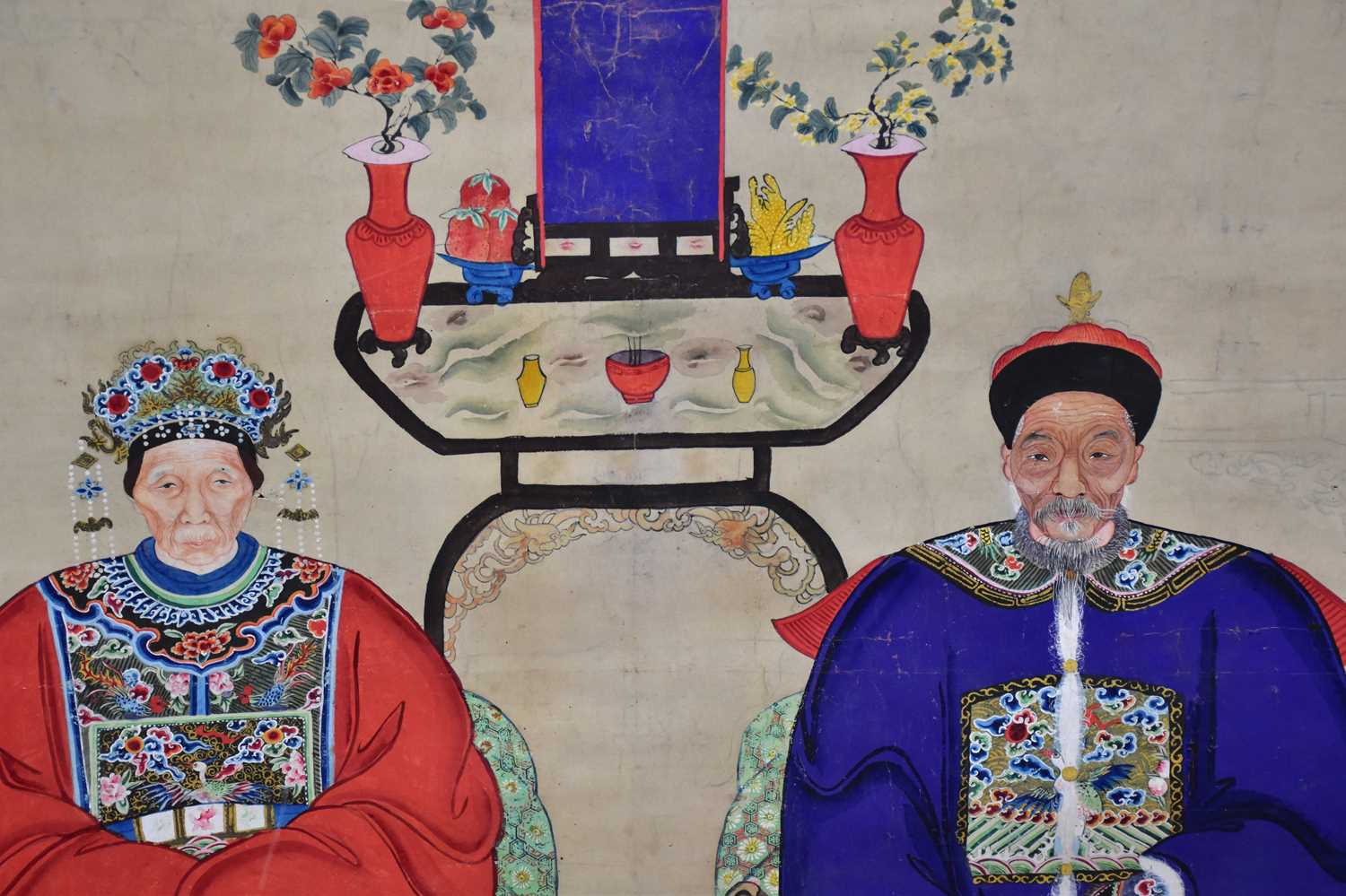 A 19th century Chinese hand painted ancestral portrait depicting elders sitting beside objects, - Image 2 of 3