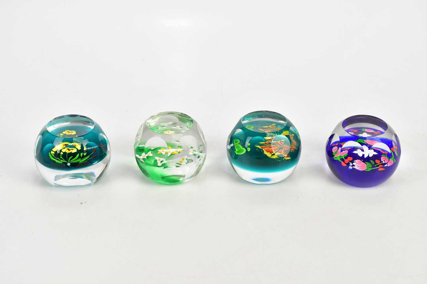 WHITEFRIARS, CAITHNESS; four contemporary faceted glass limited edition paperweights including '