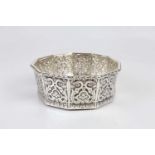 JOHN SAMUEL HUNT; a Victorian hallmarked silver decanter coaster, with embossed decoration and