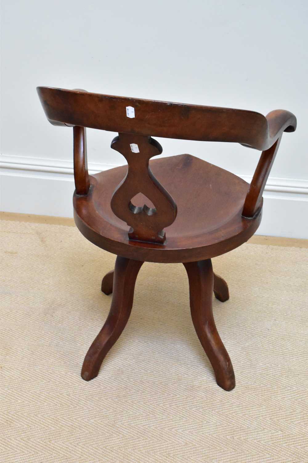 An early 20th century mahogany captain's chair. - Image 2 of 2