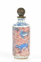 A 19th century Chinese porcelain snuff bottle, decorated with stylised animals and shells, below
