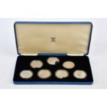 ROYAL MINT; a Queen Elizabeth, the Queen Mother seven piece silver proof set, cased, with outer