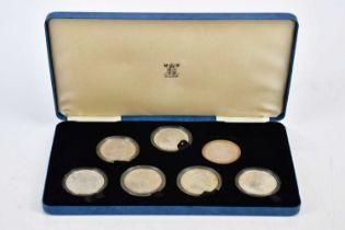 ROYAL MINT; a Queen Elizabeth, the Queen Mother seven piece silver proof set, cased, with outer