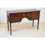 A George III mahogany sideboard, with three drawers, on tapered square legs, height 93cm, width