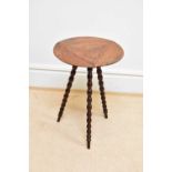An unusual 19th century mahogany drop-leaf/gypsy table on bobbin formed supports, height 64cm.