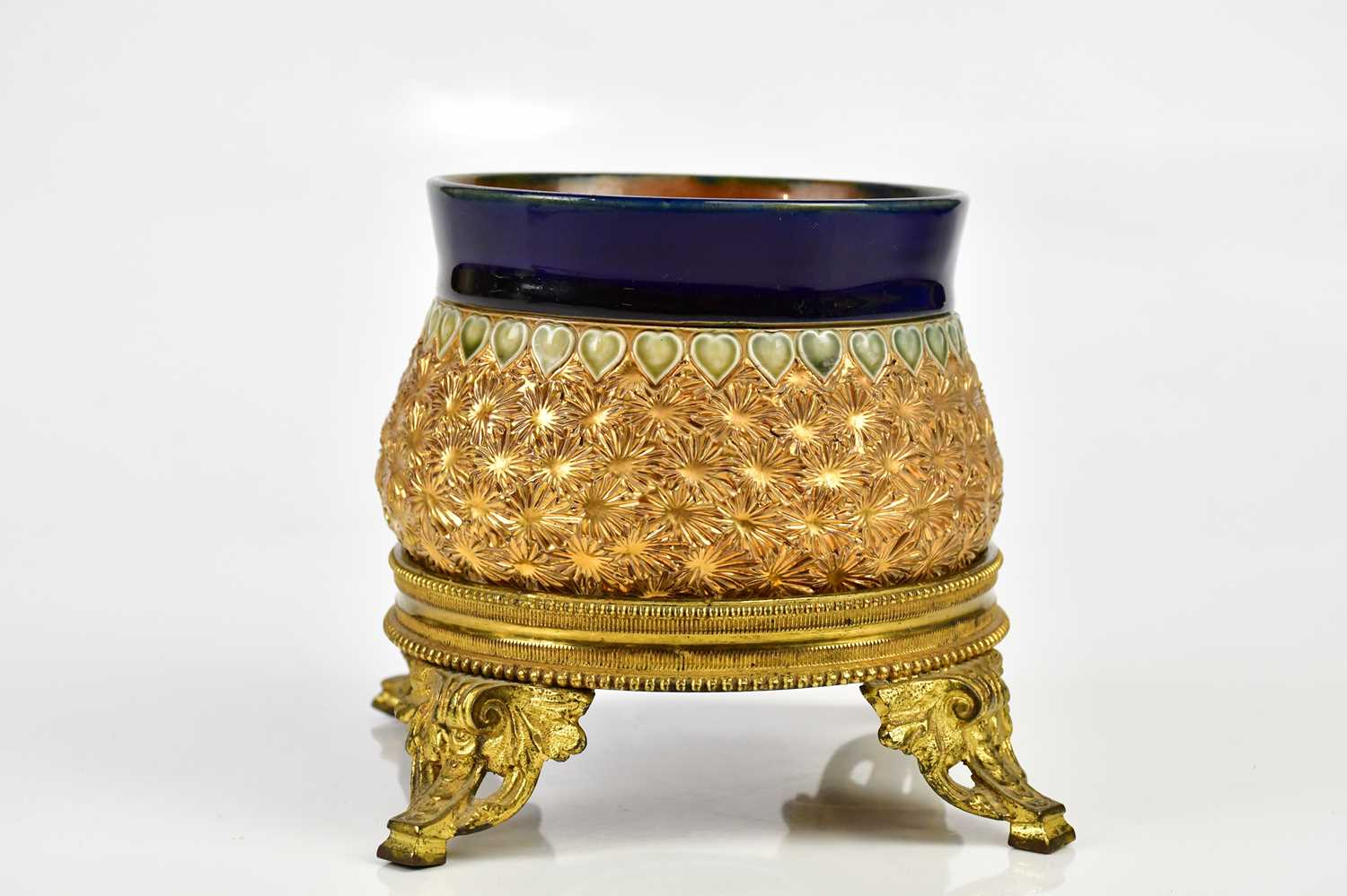 ROYAL DOULTON; gilt bowl, with maker's marks to the underside, together with associated brass stand,