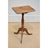 A Victorian mahogany tripod table.