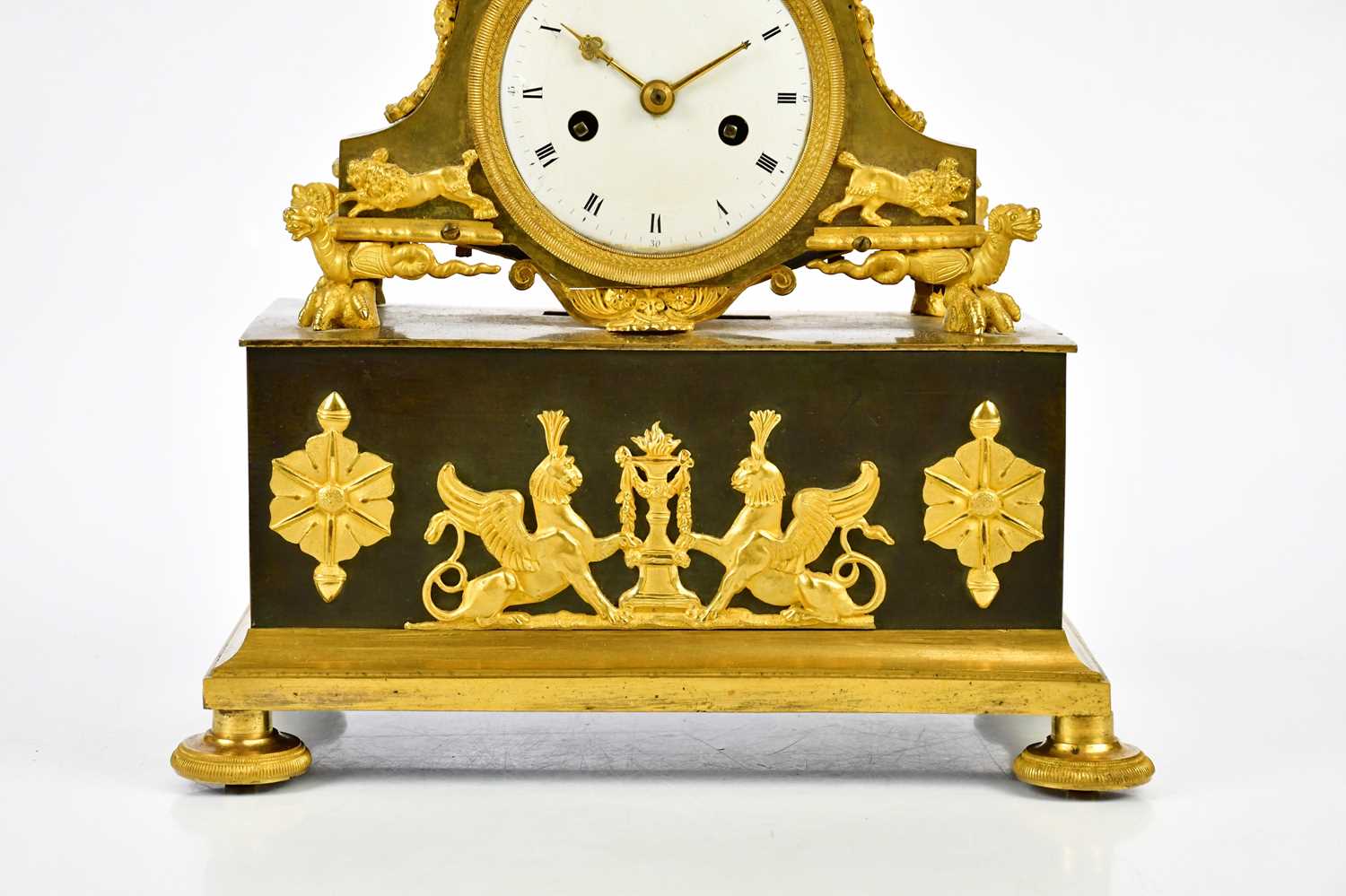 A late 19th century French ormolu mantel clock with cherubs supporting an urn finial above the - Image 4 of 7