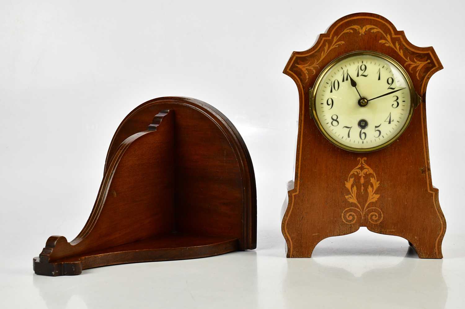 An Edwardian inlaid mahogany mantel clock with dial set with Arabic numerals, height 26cm, and a
