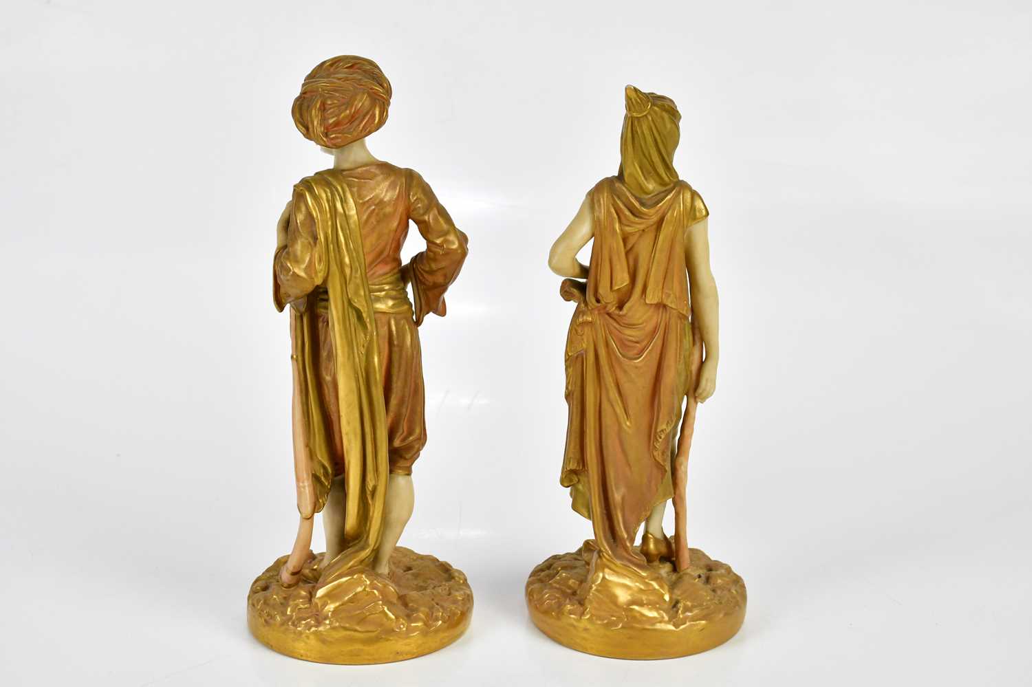 ROYAL WORCESTER; a pair of gilded blush ivory figures, an Arab male and female, numbered 1243, - Bild 4 aus 5