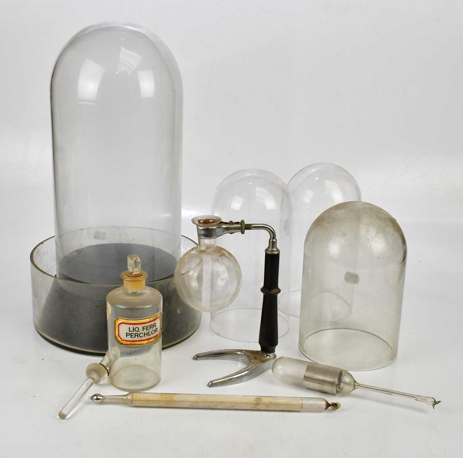 A glass apothecary jar and cover, with label for ‘Liq. Ferr Perchlor’, height 19.5cm, with a glass