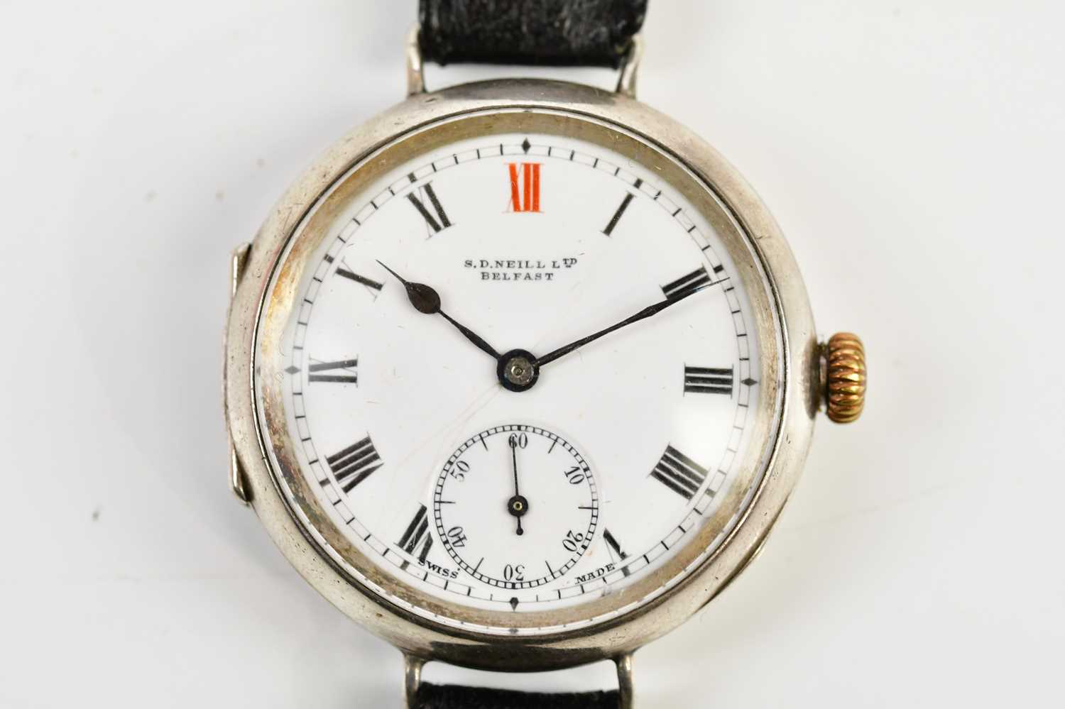 S D NEILL LTD BELFAST; a sterling silver cased trench style wristwatch, the enamel dial set with