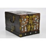 An early 20th century Chinese mother of pearl inlaid travelling box, the hinged cover enclosing a