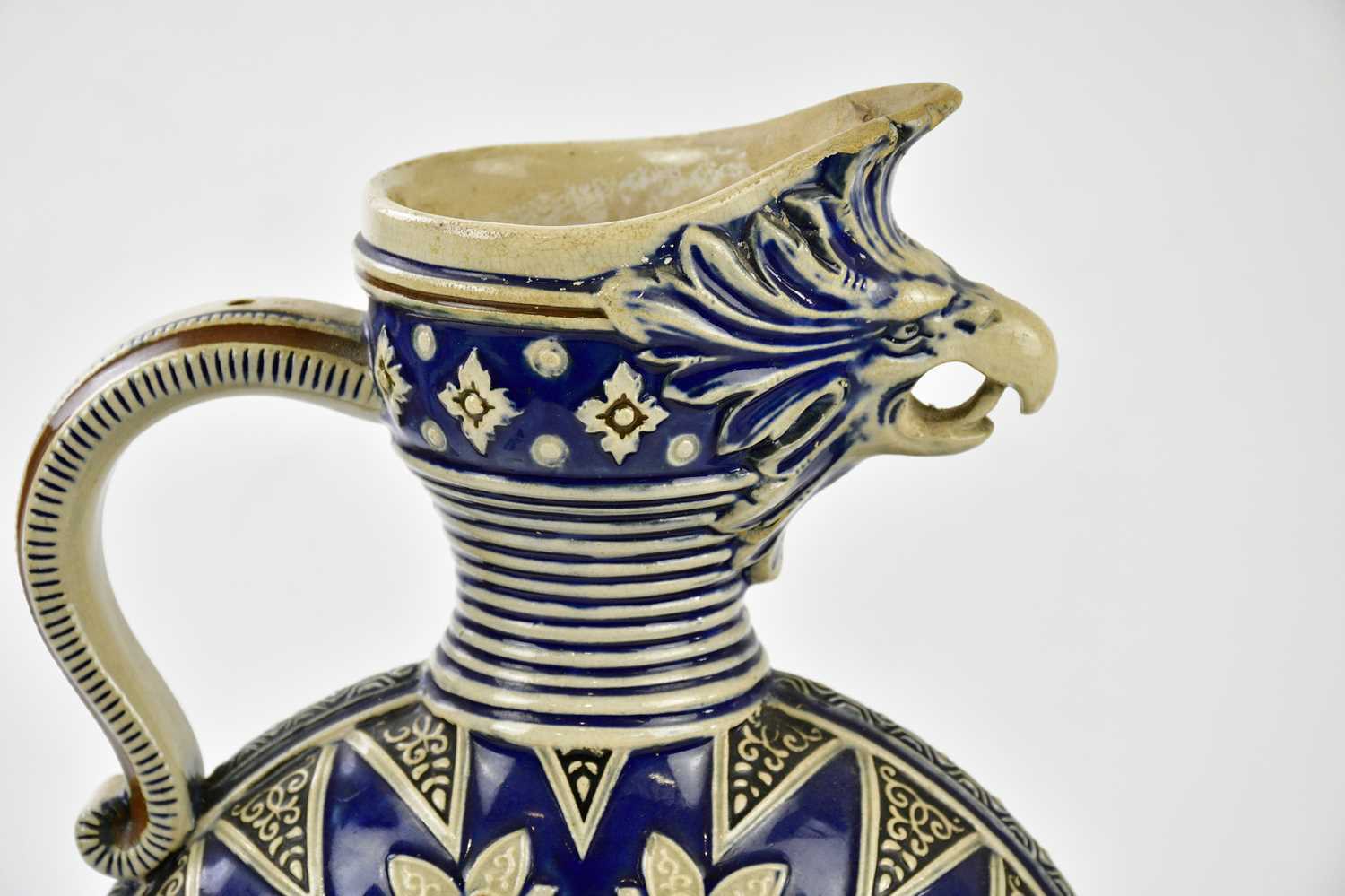 MERKELBACH & WICK; a pair of stoneware ewers, relief moulded with mythical creatures to the spout - Image 2 of 7