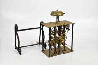 A modern comtoise skeleton clock in the manner of Michel Gaignon, with brass bell and wrought